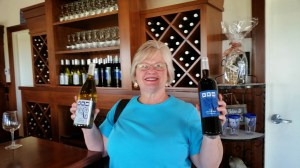 Charlene celebrates by picking two wines after our first tasting today. A red for Ed and a muscato for Charlene.