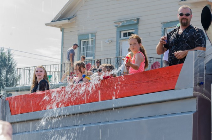 The kids in this float loved spraying people with water.