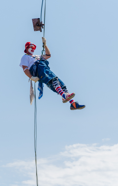 The log show started with the clown dropping in.
