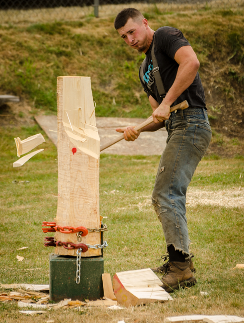 The power as this guy chopped through the wood was amazing. Wood chips fly when his ax connects with the log.