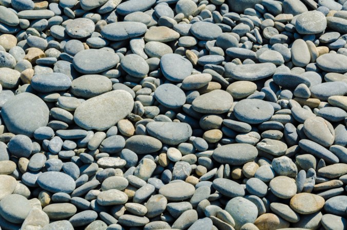 Very smooth river rock covered several sections of the beach.